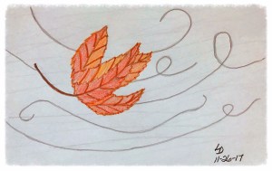 Fall Leaf blowing in the wind